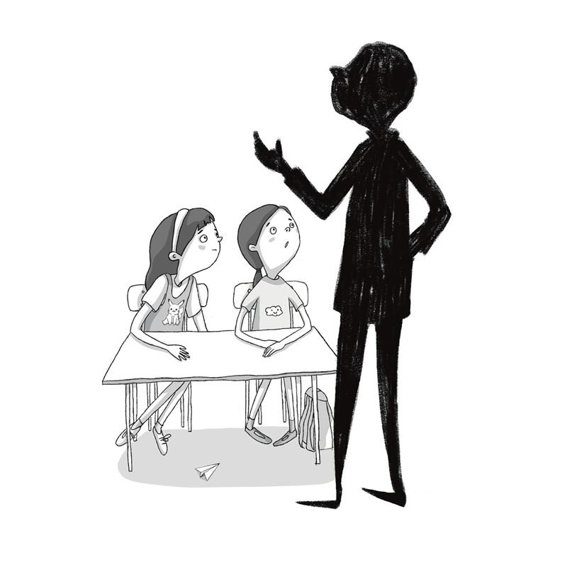 Drawing: two girls at a school desk and a tall teacher in silhouette